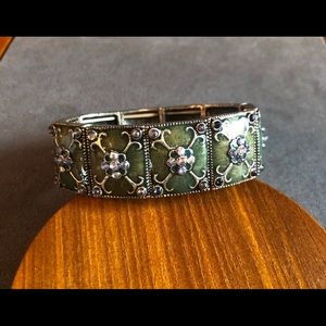 Green enameled and rhinestone silver bracelet